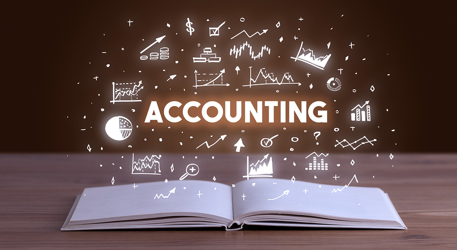 ACCOUNTING inscription coming out from an open book, business concept